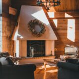 A sunlight room in a cabin with a warm fireplace